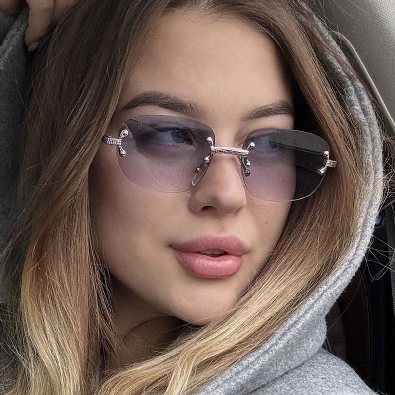 Frameless cut edge oval fashionable and high-end Instagram popular sunglasses of the same style